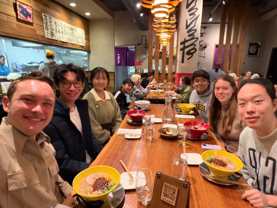 Club members at a long table at Ippudo