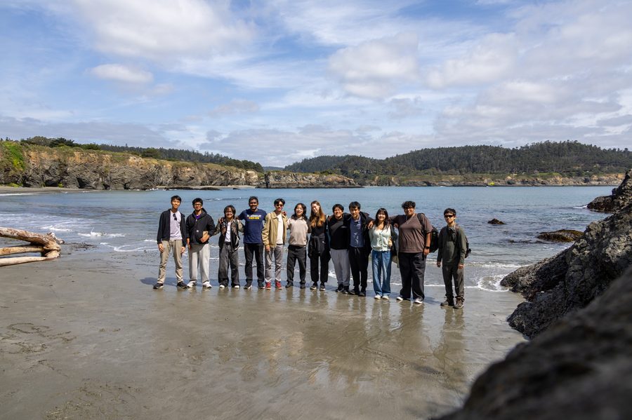 Club members on a beach in Mendocino